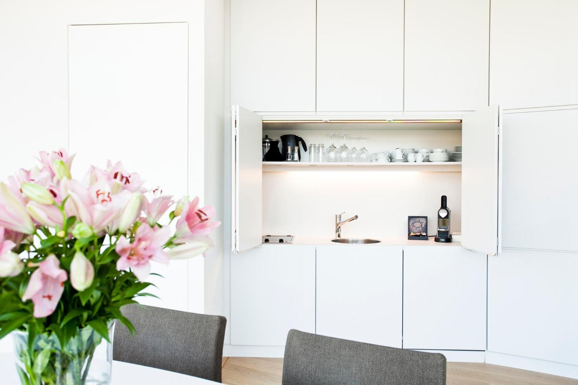 Schlossberghotel Γκρατς Εξωτερικό φωτογραφία A kitchen in a serviced apartment